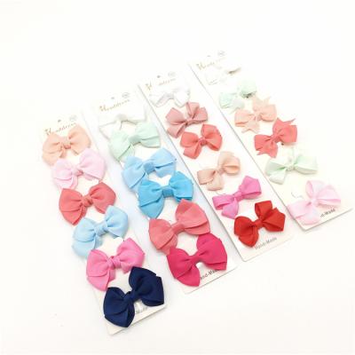 China Good price children hair bow hairpins a card pure color hair bow set baby hair accessories FJ6001 for sale