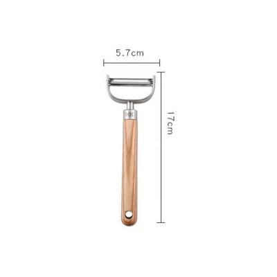 China Sustainable Stainless Steel Instrument Cooking Tools Wooden Handle Slicer Vegetable Peeler Potato And Carrot for sale