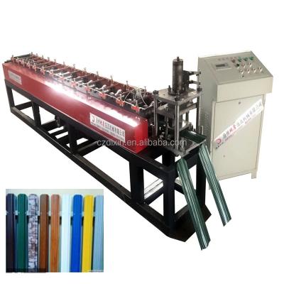 China Building Material Shop Dixin Zinc Sheet Picket Roll Forming Machine From China for sale