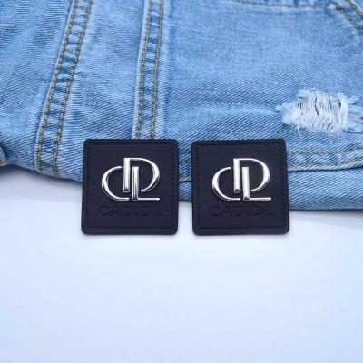 China Waterproof Low Price Embossed Leather Patches Sew On Clothing Neck Shirt Logo Tag Jeans Self Adhesive Label Women Bags Handbags for sale