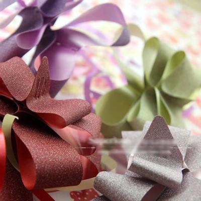 China Holographic Christmas Tree Decoration Ribbon Bow Fireworks Gift Metallic Bow for sale