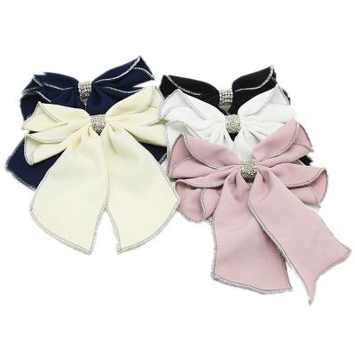 China 2021 Soft Comfy Summer And Spring Silver Overlock Satin Bow With Stone Clasp Elegant Alligator Boutique Style French Bowknot Clips for sale