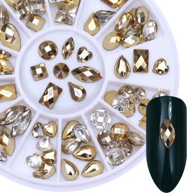 China Widly 3D Nail Art Rhinestone Wheel Charms Gold Double Sided Nail Art Decorations Nails Tips Heart Water Drop Shape for sale