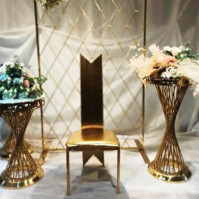 China Modern Wholesale Banquet Frame Gold High Grade Stainless Steel Special Shaped Wedding Ribs Chair for sale