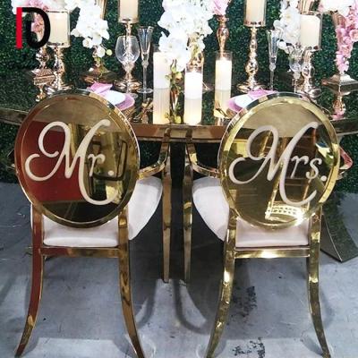 China 2020 Inventories Modern Titanium Bride and Groom Gold Stainless Steel Wedding Chair for sale