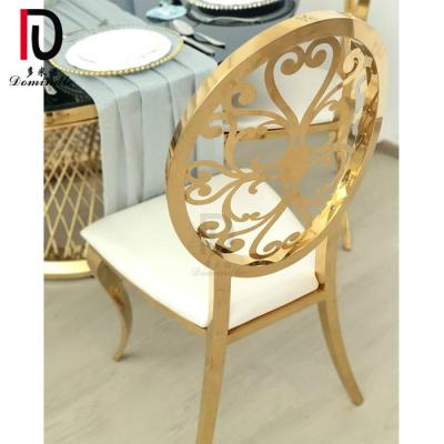 China Be stackable ect luxury new design /durable /strong hollow gold stainless steel floral wedding chair for sale