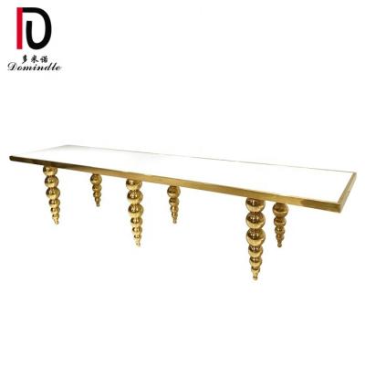 China Stainless steel+glass /mdf Dubai design gold stainless steel frame MDF top wedding dining table for sale