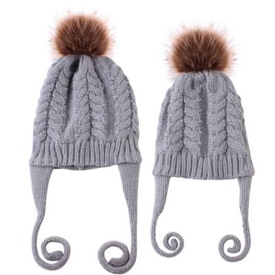 China New Fashion 2Pcs Mommy Baby Flip Flop Faux Fur Pompom Hat Beanie Kids Acrylic Knitted Parent-Child COMMON Warm Winter Hats for sale