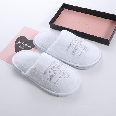 China Logo Embroidered Wholesale Hotel Washable White Customized Washable Slipper for sale