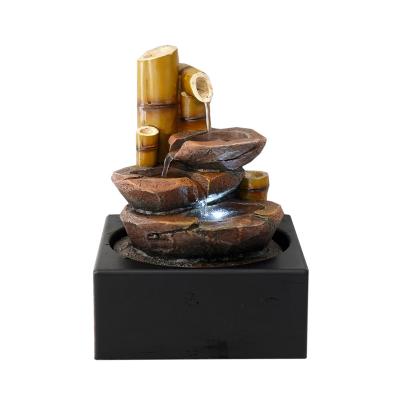 China 2022 China Polyresin Home Decorative Rock Hot Sale Tabletop Bamboo Stone Fountain With Led for sale