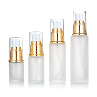 China Cosmetic Use Frosted Glass Bottle 30ml 50ml Face Cream Bottle 15ml 20ml Cosmetic Lotion Bottle With Gold Pump Cap for sale