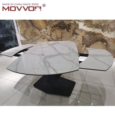 China Revovling Modern Dining Room Furniture Extendable Ceramic Top Powder Coated Paint Dining Table for sale