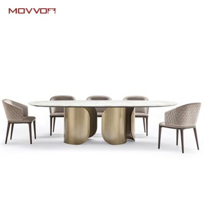 China Classic Convertible High Level Modern Modern Furniture White Marble Oval Dining Table With Stainless Steel Curve Base for sale