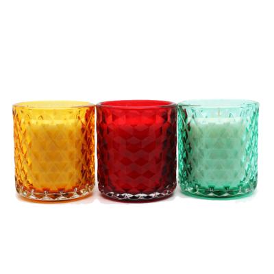 China Flame Joys House 2022 Colored 8x9 Machine Patterned Christmas Glass Colored Scented Candle for sale