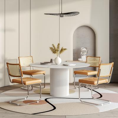 China Extendable dining table apartment dining table and chair combination modern simple round small household for sale