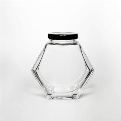 China Unique Shape 100ml Honey Hex Glass Jar For Honey Jam Jelly Storage With Metal Cap for sale