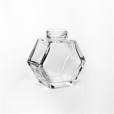 China Honey 100ml 220ml 380ml Hexagon Glass Jar For Honey Storage Bottle With Metal Screw Lid for sale