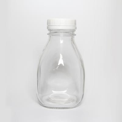 China Beverage Juice Bottle 500ml Cold Pressed Clear French Square Glass Bottles With Plastic Screw Cap for sale