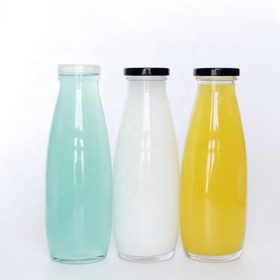 China Wholesale Empty Clear Round Beverage Beverage Bottle 500ml Glass Milk Bottle With Metal Lid for sale