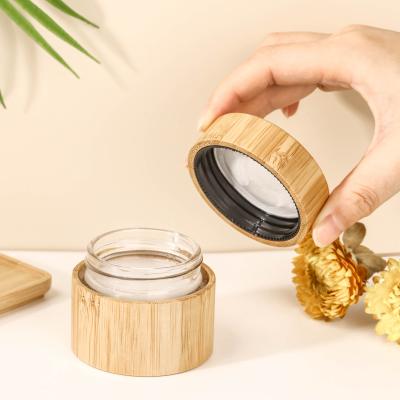 China 20g 30g 50g 100g Glass Cosmetic Bamboo Cream Jar Glass Cosmetic Jars With Bamboo Lid for sale