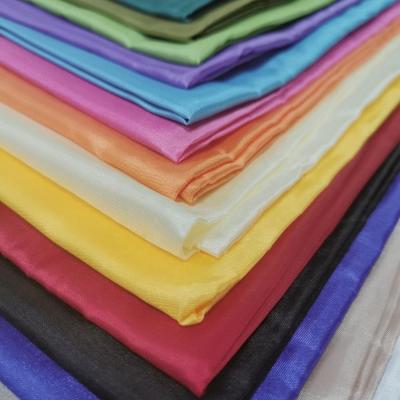 China High Quality Shrink-Resistant 100% Coating Fabric Polyester 210T Habutai Porcelain Silk Fabric Plain Dyed 50G/M for sale