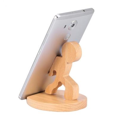 China Universal Desktop Stand Gifts Tablet PC Phone Holder,KongFu Wooden Crafts Desktop Small Man Desktop Mobile Phone Stand and Tablet Holder for sale