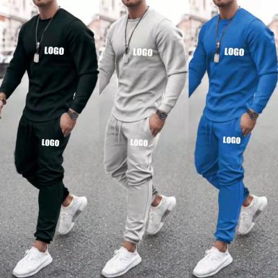 China Breathable Custom Logo Training Fitness Sports Trousers Men Two Piece Set Tracksuit for sale