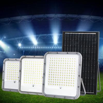 China KCD Aluminum Dusk To Dawn White Deamable Brightest Solar Flood Lamp Garden Solar Flood Lights IP67 100w  Motion Sensor for sale