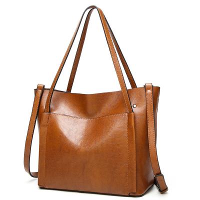 China Lady Large Pockets Luxury Women's Tote Bag Vegan Leather Lady Handbags Cross - Body Shoulder Bags for sale