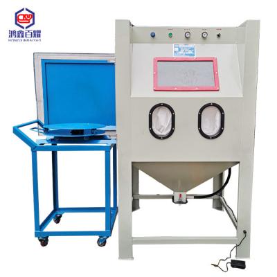 China Environmental protection 1010 hand material surface blast rust cleaning oxidation abrasive treatment sandblasting machine with side door opening for sale