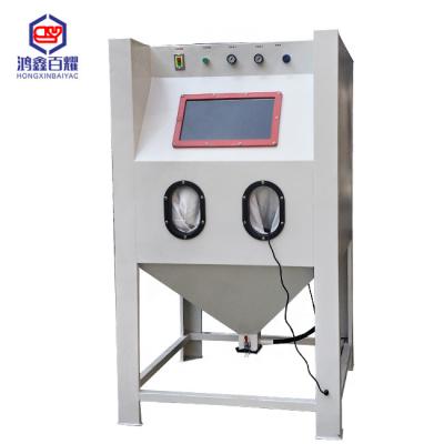 China Surface Treatment 1010 Simple Operation Dry Hand Sandblasting Machine Dustless Large Vertical Sandblasting Machine for sale