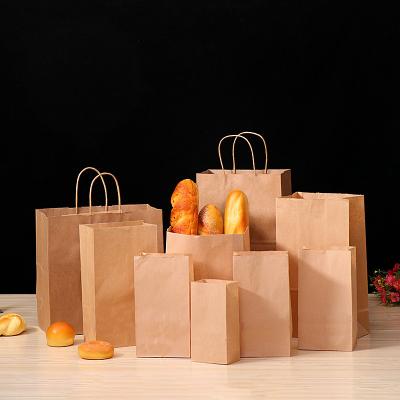 China Recyclable Custom Logo Kraft Paper Gift Apparel Cosmetics Packaging Brown Shopping Bag for sale