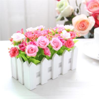 China Hot Artificial Flowers Desktop Decoration Amazon Rose In The Fence Pot Pack Mini Potted Plant For Home Wedding Decor for sale