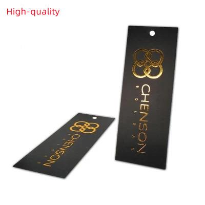 China Durable Specially Paper Plastic Tags Printing Embossed Foiled Label Paper Tag UV Technology Customized Price Tag For Jeans Clothing And Garments for sale