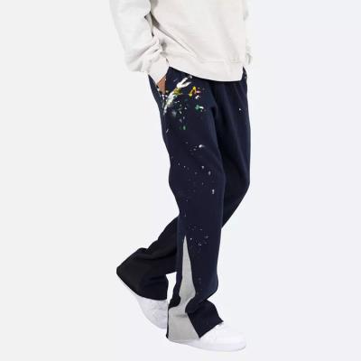 China 100%Cotton Anti-Wrinkle Mens Flare Pant Fleece Rocket Track Pants Graffiti Splatter Paint Ink Unisex Custom Pants for sale