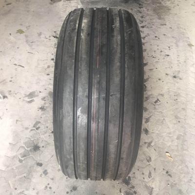 China Genuine Natural Rubber Racing Machine Tire 14L-16.1 27x9.5-15 Racing Machine Combine Tire Ahead for sale