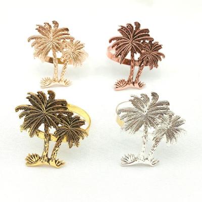 China Viable Gold Accessories Napkin Rings Holder Palm Tree Metal Stocked Feature Simple Napkin Rings For Wedding for sale