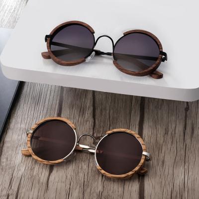 China Mens Women Sun Real Glass Designer Fashion Sunglasses Brand Handmade Wooden Frame Retro Polarized Round Steampunk Wood Sunglasses Free Logo for sale