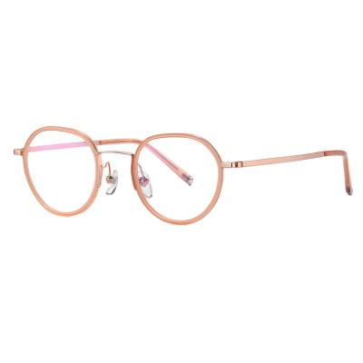 China Titanium pure titanium luxury eyeglass frames round ultra-light pure titanium high elasticity optical glasses for sale