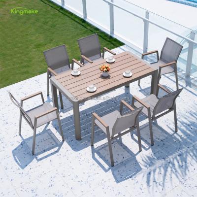 China Modern fast delivery 6 seater outside dining table and chair set black aluminum balcony table set outdoor cafe furniture with low price for sale