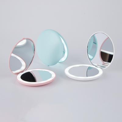 China Portable Handheld Pocket Mirror Travel Handheld Mirror Round Led Makeup Light Mirror With Custom Logo for sale