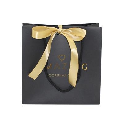 China Recycled Materials Printing Custom Black Printing Grocery Gift Packaging Shopping Paper Bag With Logo And Gold Ribbon for sale