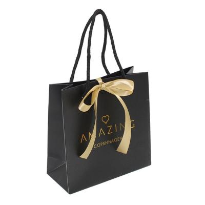 China Recycled Wholesale Materials Custom Logo Black Printing Paper Gift Shopping Bag / Kraft Paper Bag For Luxury Jewelry Packaging for sale