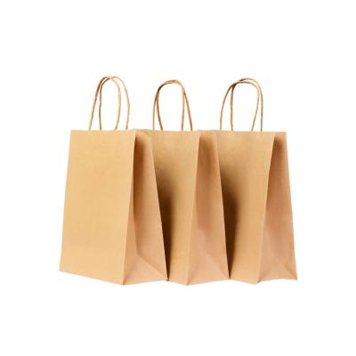 China Recycled Materials Wholesale Custom Printed Biodegradable Kraft Paper Gift Shopping Bags for sale