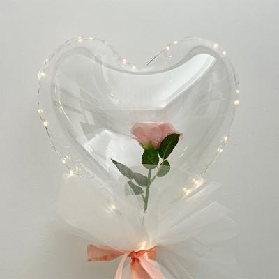 China Gift Toy New Design Heart Shape Led Light String Bobo Balloon Transparent With Rose For Valentines Day for sale