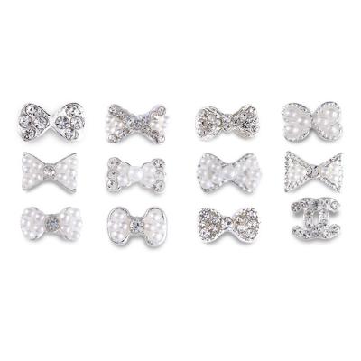 China 2022 12 kinds factory price design pearl bow nail the new Art Alloy Jewelry Designer Nail Charm Accessories Nails Art Accessories for sale