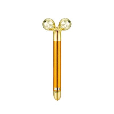 China 24k Bar Gold Electric Pulse Beauty Roller T-Shape Metal Facial Massager For Home Use for sale