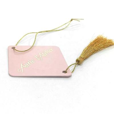 China New Product Clothing Jeans Hangtag Rose Gold Sustainable Character Toy Shoes Customized Hangtag for sale