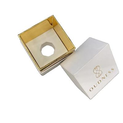 China Disposable Luxury Custom Logo Gold Staming Rigid Paper Perfume Packaging Design Gift Box With Insert for sale