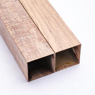 China Construction And Production Low Price Wood Grain Surface Customized Red Oak Grain Of Stainless Steel Tube Use For Decorative for sale